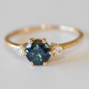 Three stone sapphire and diamond ring
