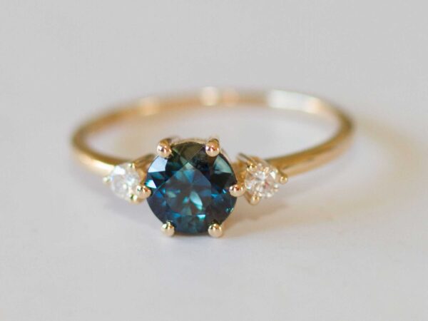 Three stone sapphire and diamond ring